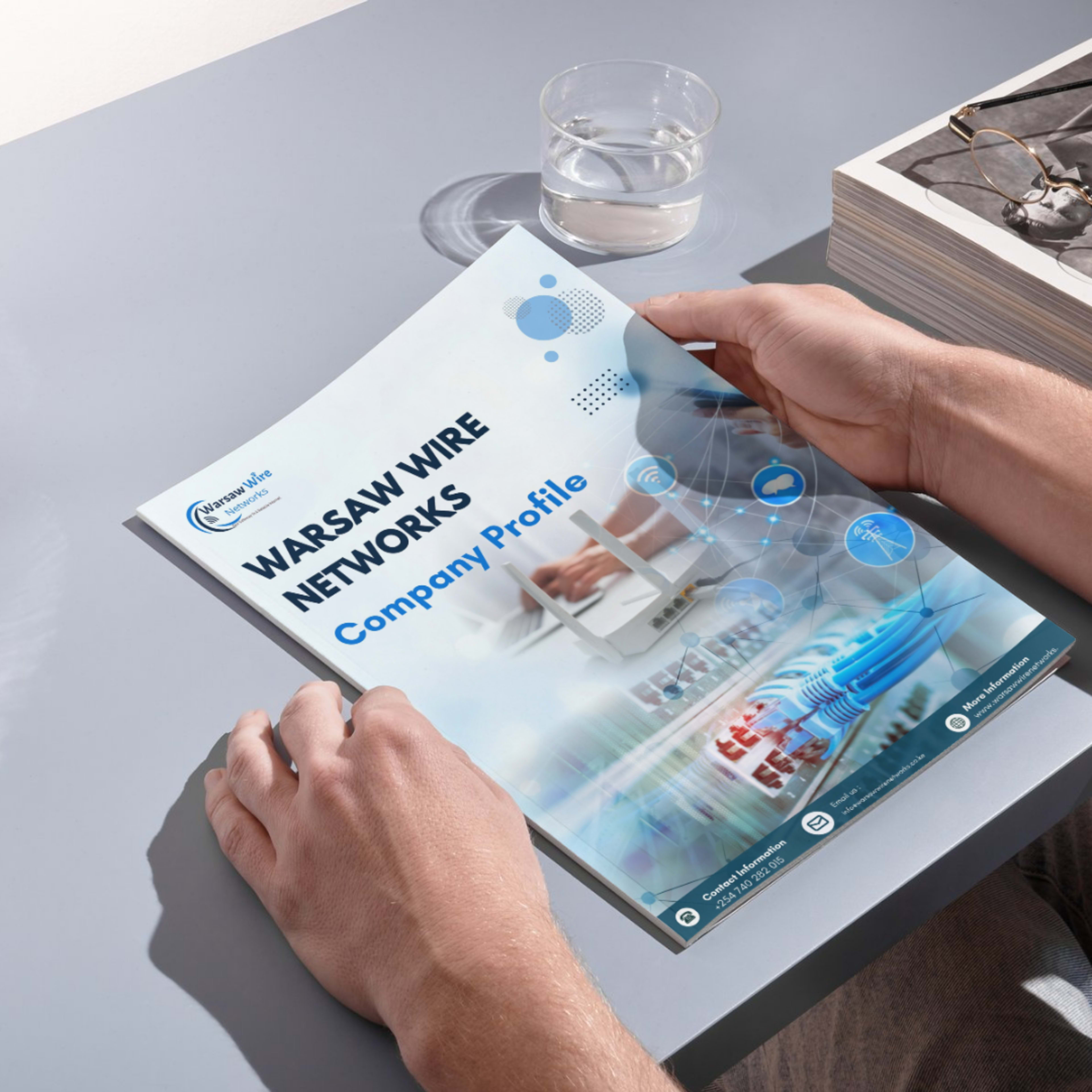 Open company profile booklet with editorial layout